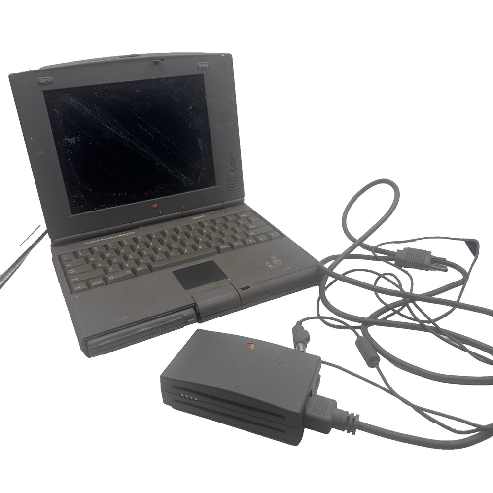 Vintage Apple Macintosh PowerBook Duo 2300c PowerPC Laptop Powers On AC Adapter